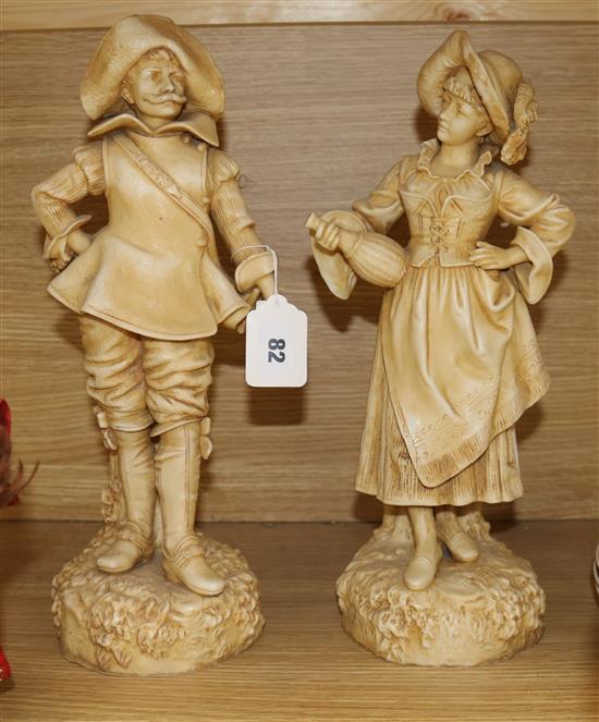 A pair of Continentals porcelain figures, cavalier and a lady tallest 40cm